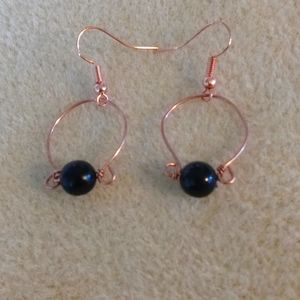 Copper horseshoe earrings with black bead